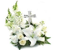 fiori bianchi e croce Onoranze funebri Gamberini