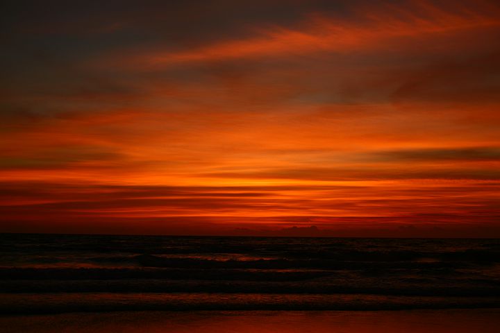 tramonto mare rosso Onoranze funebri Gamberini